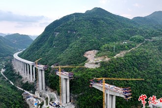 【社會(huì)】爐慈高速公路甘溝河特大橋合龍